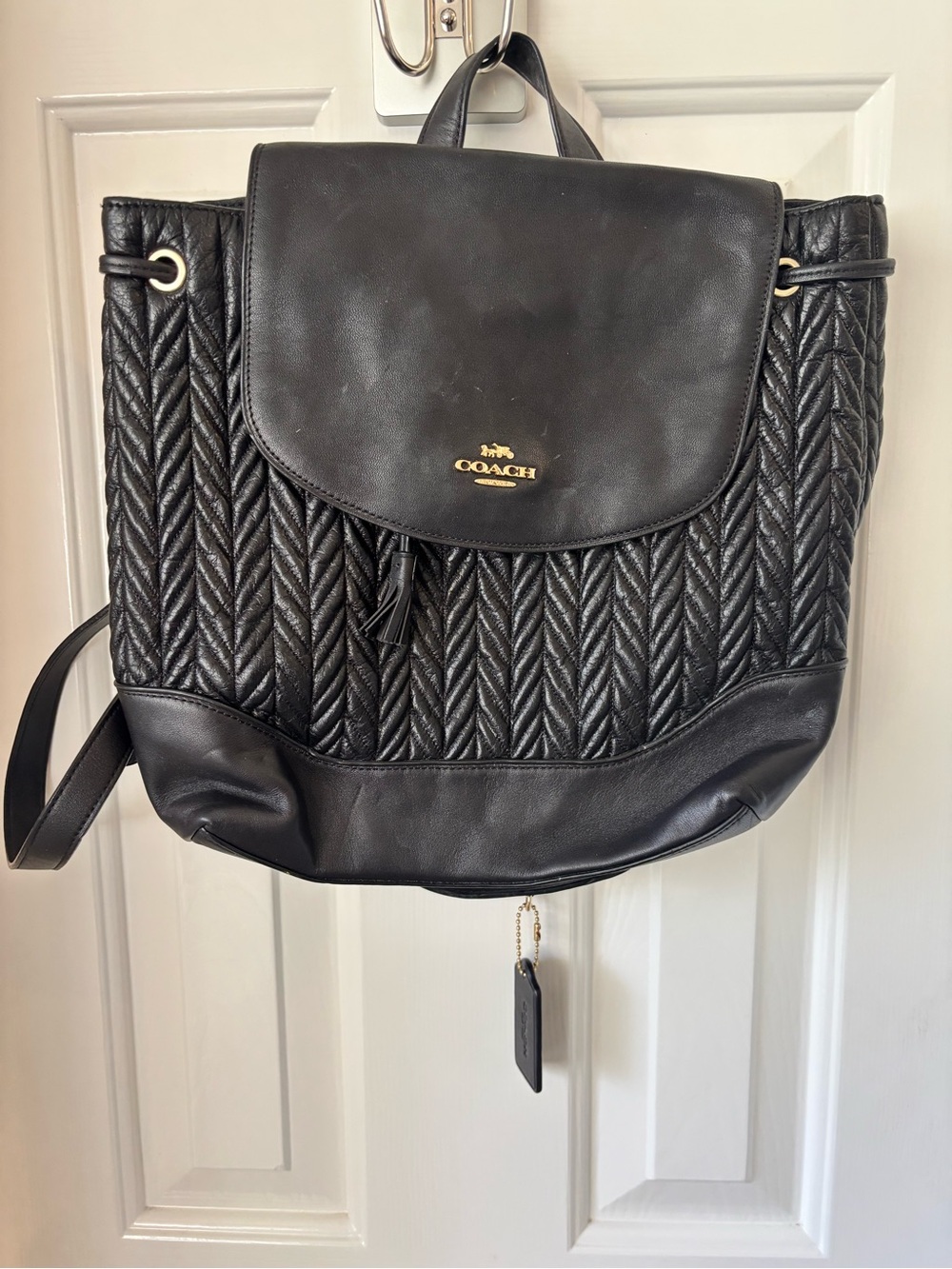Coach Black Quilted Leather Drawstring Backpack with Gold Logo